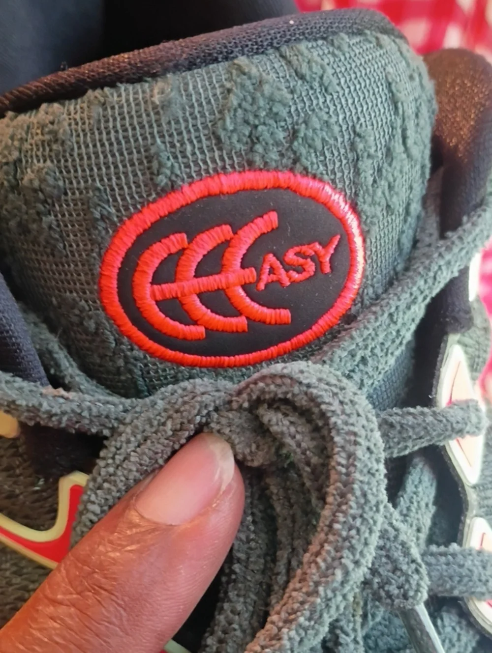 Nike Men’s Black Athletic Shoes with Green and Red Accents